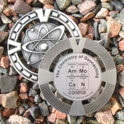 AmMo CaN - The Chemistry of Geocaching - Antique Silver Geomedal Geocoin