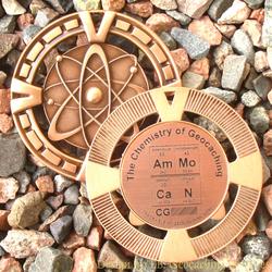AmMo CaN - The Chemistry of Geocaching - Antique Bronze Geomedal Geocoin
