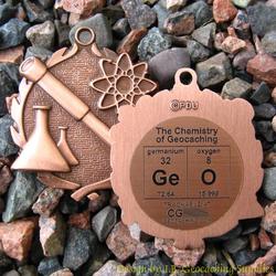 GeO - The Chemistry of Geocaching - Antique Bronze Small Shaped Geomedal Geocoin