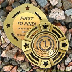 FTF (First to Find) Small Geomedal Geocoin with Star Cutouts