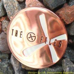 The G-Files - Copper Geocoin with White Glow